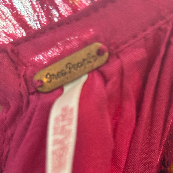 Free People fushia jumpsuit. Wide, flowy legs and tie in back. Size medium. - Picture 1 of 5